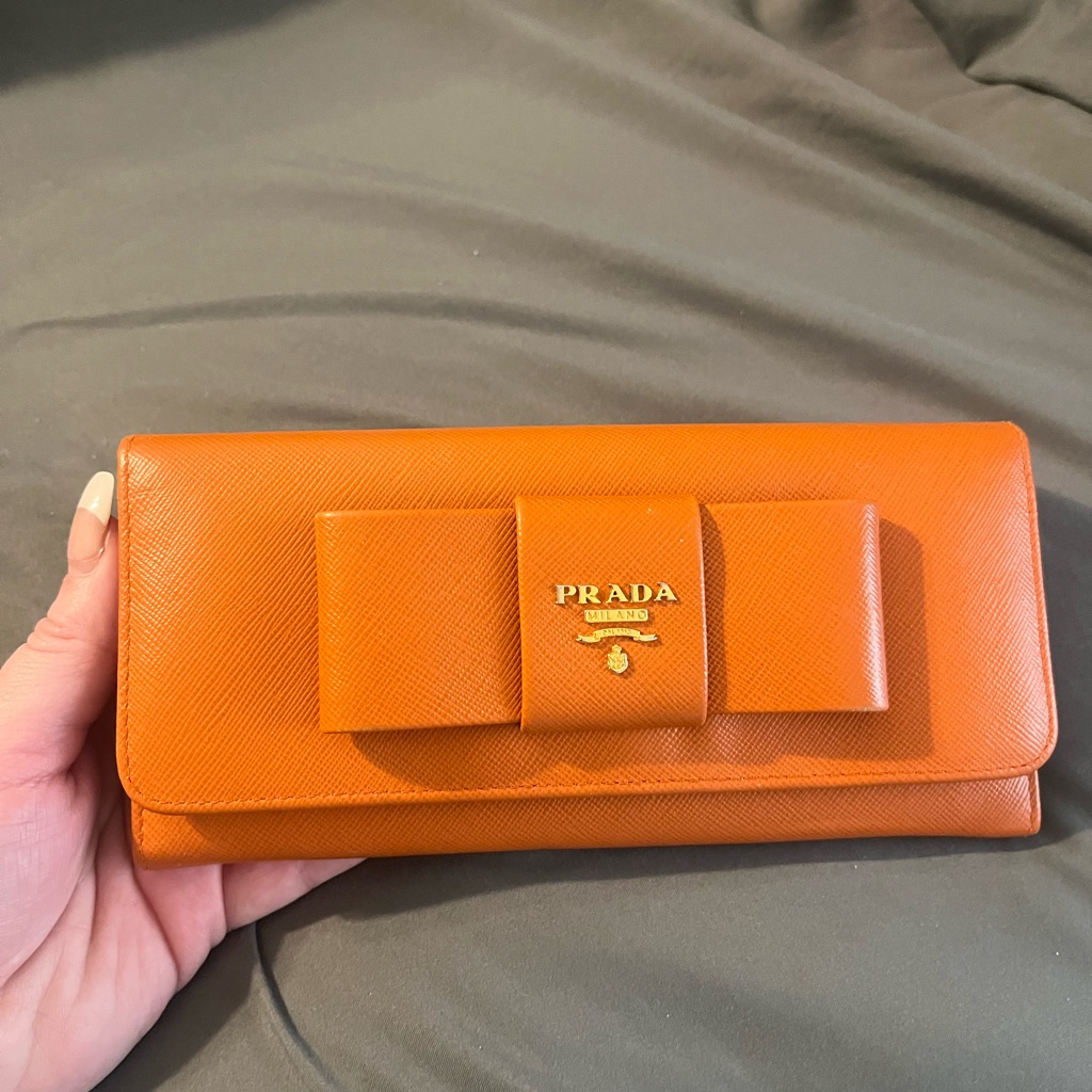 Prada Orange Saffiano Bow Wallet With Gold Logo